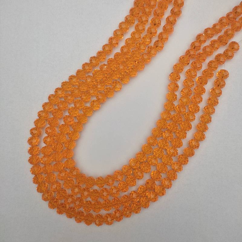 Korálky Český křišťál oranžové průhledné brusované rondely, průměr 8×6 mm ±, délka 41 mm ± na niti