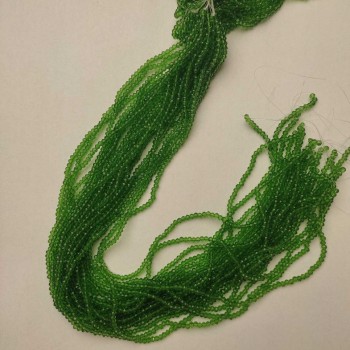 Korálky českého křišťálu zelené, průhledné, broušené rondely, průměr 3×2,5 mm, délka cca 37 cm na vlásence