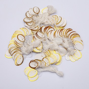 Цінник на нитці 26х17мм+- 100 шт