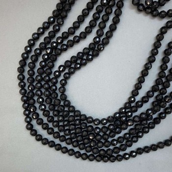 Korálky Český křišťál na niti – černé matné brusované kuličky, průměr 8 mm, délka 50–51 cm