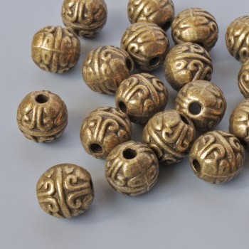 Bronzové korálky-vložky, průměr 7 mm, průměr dírky 1,7 mm, balení 16 ks ± bronzová barva kovu