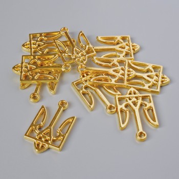 Přívěšek, bižuterní součástka „Erb“, rozměr 25×15 mm, průměr otvoru 2,1 mm, balení 7 ks ±, zlatistý odstín kovu