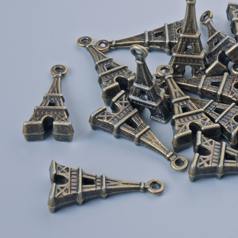 Přívěšek „Eiffelova věž“, bronzový, průměr 26×9 mm, průměr dírky 1,7 mm, balení 13 ks ± bronzová barva kovu