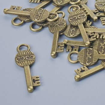 Přívěšek «Klíč», bronzová barva kovu, průměr 26×8 mm, otvor 3,5 mm, balení 16 ks ±