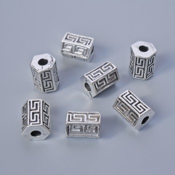 Šperkové komponenty – vložená korálka, rozměr 10×7 mm, průměr otvoru 2,9 mm, balení 7 ks, ±20 g, stříbrná barva kovu
