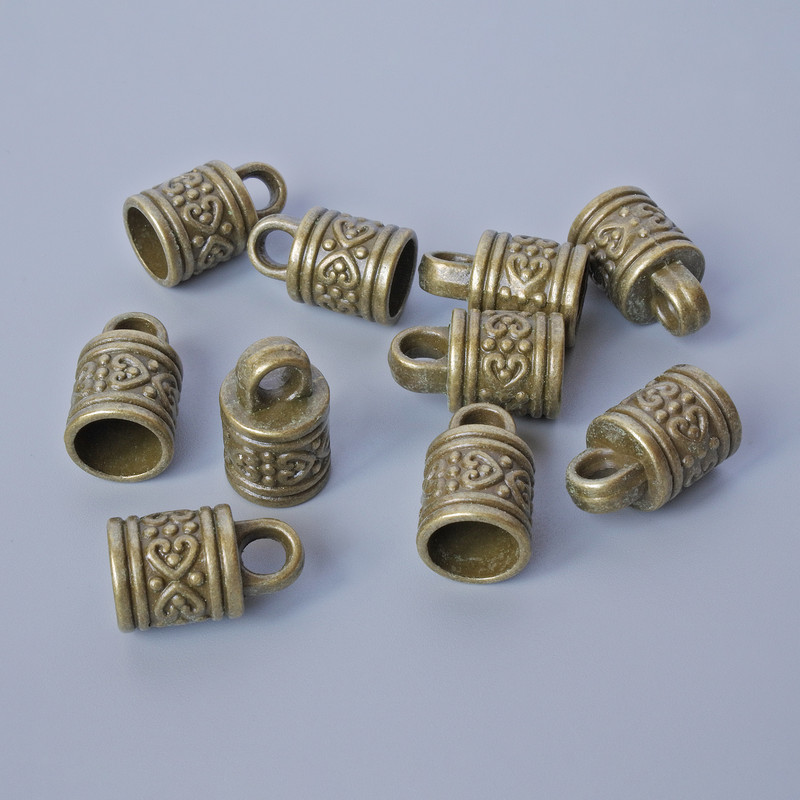 Koncovka bronzové barvy, průměr 16 × 10 mm, průměry otvorů 3,5 mm a 7,7 mm, balení 10 ks