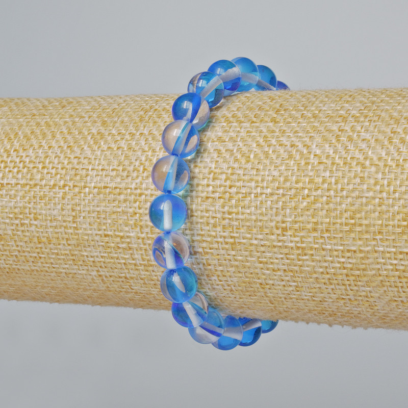 Náramek z opálového skla, hladká kulička, barva modrého průhledného chameleona, průměr 8 mm ±, délka 18 cm ± (elastický)