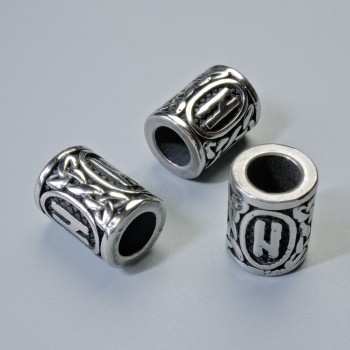 Korálek se skandinávskou runou, rozměr 13×10 mm (+/-), otvor 6 mm, stříbrná barva kovu, 1 ks