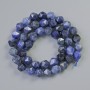 Korálky sodalitu, přírodní kámen, multifacetované, průměr 7×8 mm, délka cca 36 cm na niti