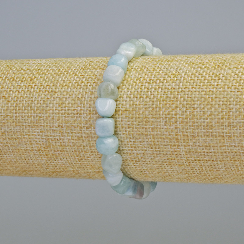 Náramek z přírodního akvamarínu, facetované korálky, průměr 7 mm ± (elastický), délka 18 cm