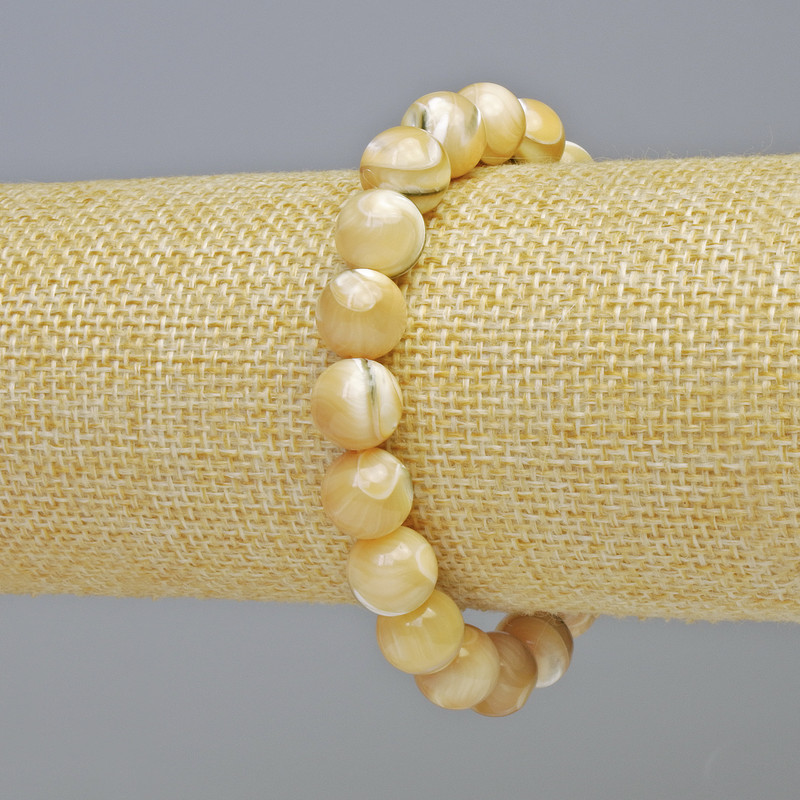 Náramek z přírodní perleti, hladké kuličky, průměr 10 mm ± (elastické), délka 18 cm