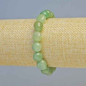 Náramek z přírodního nefritu, facetované korálky, průměr 8×10 mm ± (elastická šňůrka), délka 18 cm+