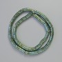Rondelové korálky hematitu, barva chameleon zelená, průměr 6×2 mm, délka 42 cm na niti