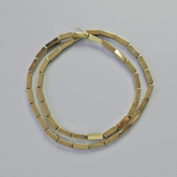 Korálky hematit obdélníkového tvaru zlaté barvy, rozměry 9×3 mm, délka 41 cm – šňůra