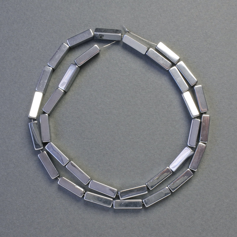 Hematitové korálky obdélníkového tvaru, stříbrná barva, průměr 12×4 mm, délka 42 cm, navlečené