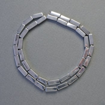 Hematitové korálky obdélníkového tvaru, barva stříbrná, rozměr 10×4 mm