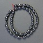 Korálky hematitu oválné černé, průměr 10×6 mm, délka 41 cm, šňůra