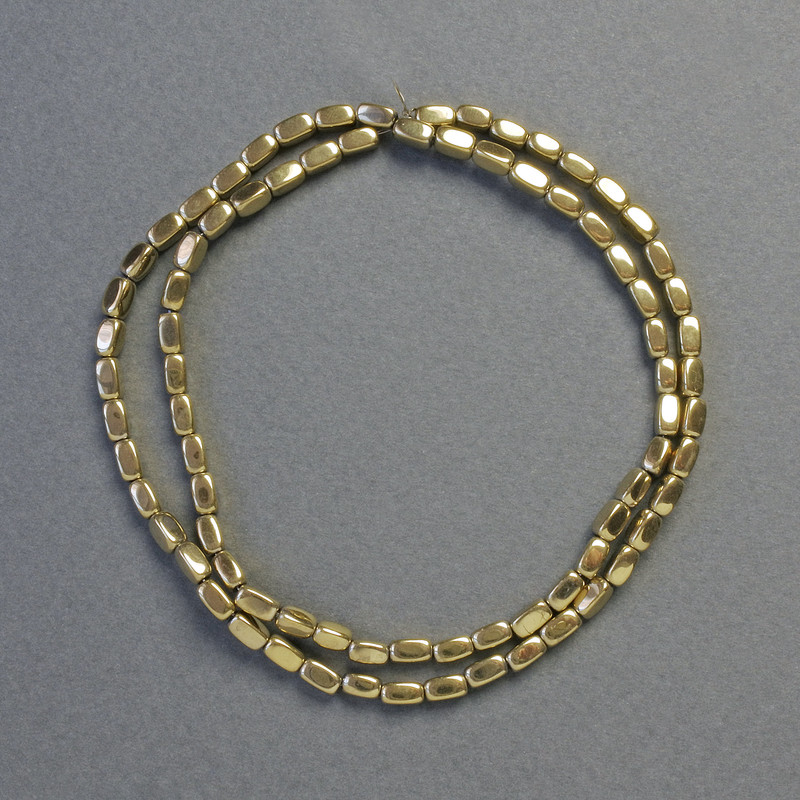 Korálky z hematitu zlaté, oválné obdélníkové, průměr 3×5 mm, délka cca 41 cm, řetízek