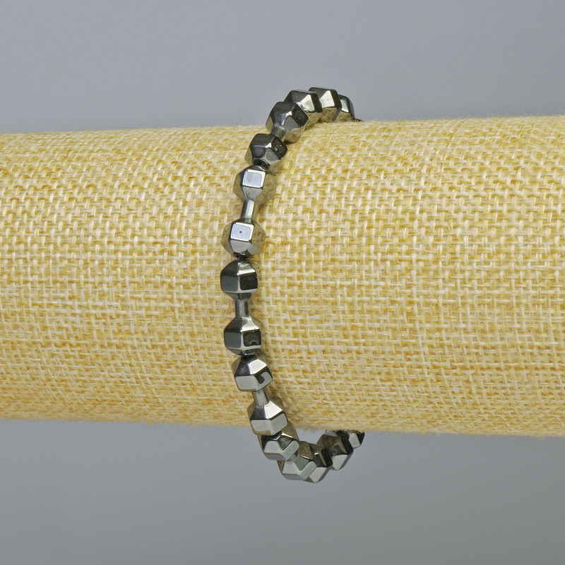 Náramek z hematitu ve tvaru činky, černé barvy, průměr 15×6 mm, délka 18 cm ± (elastický)