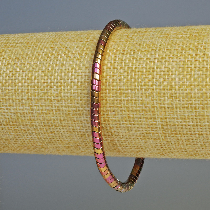 Náramek z hematitu – rondely ve tvaru vlny, vícebarevný zlatý, průměr 4×2 mm, délka 18 cm, elastický