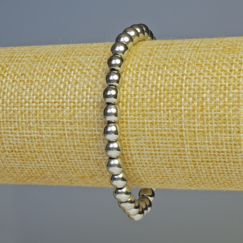 Náramek z hematitu – kuličky, barva stříbrná, průměr 6 mm, délka 18 cm, elastická guma