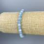 Náramek z akvamarínu, broušené kuličky o průměru cca 6 mm, délka 18 cm ±, elastický