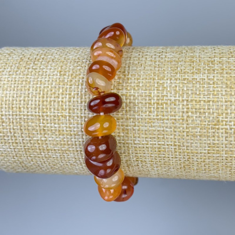 Náramek z karneolu – brusované korálky, průměr 8–15×5–8 mm, délka 18 cm, pružný
