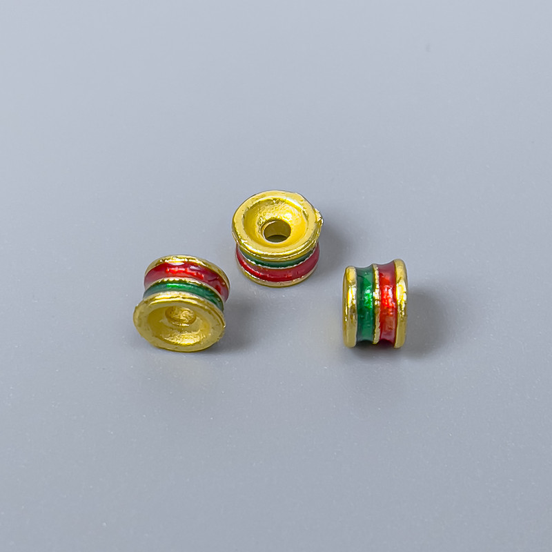 Korálek Cloisonné rondel červeno-zelený smaltovaný 6×4 mm