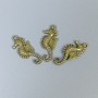 Přívěšek Mořský koník, bronzová barva kovu, rozměry 29×12×2 mm, otvor cca 2 mm, balení 11 ks