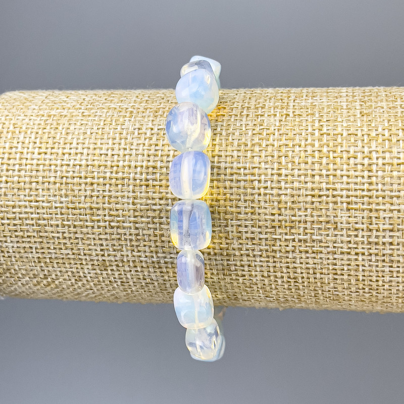 Náramek z měsíčního kamene, facetované korálky, průměr cca 11×8 mm, délka cca 18 cm, elastický