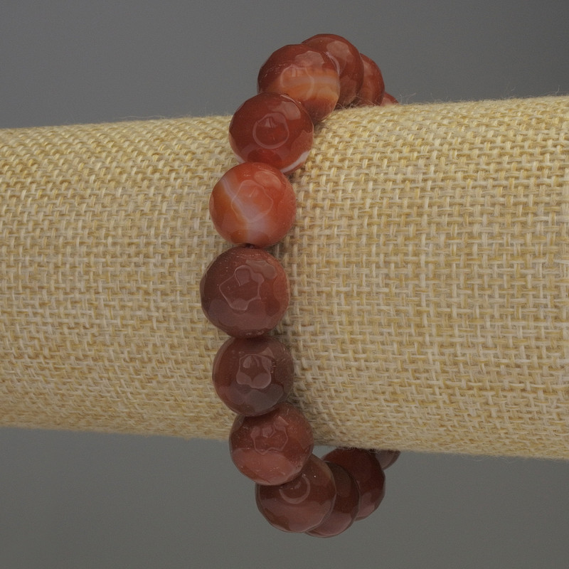 Náramek z karneolu s facetovanými kuličkami, průměr 12 mm, délka 18 cm, elastický