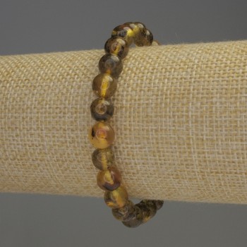 Náramek z jantaru – hladká korálka, průměr cca 8 mm, délka cca 18 cm, elastický