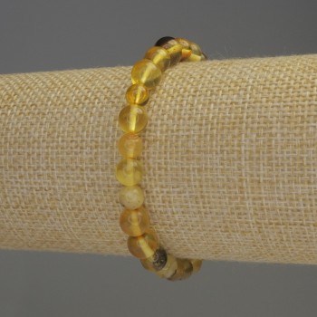 Браслет Бурштин гладка кулька, діаметр 6-6, 5мм+-, довжина 18см+- стрейч