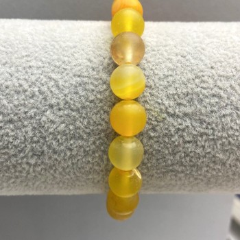 Náramek z matného achátu s hladkou kuličkou o průměru cca 8 mm, délka cca 18 cm, elastická šňůra