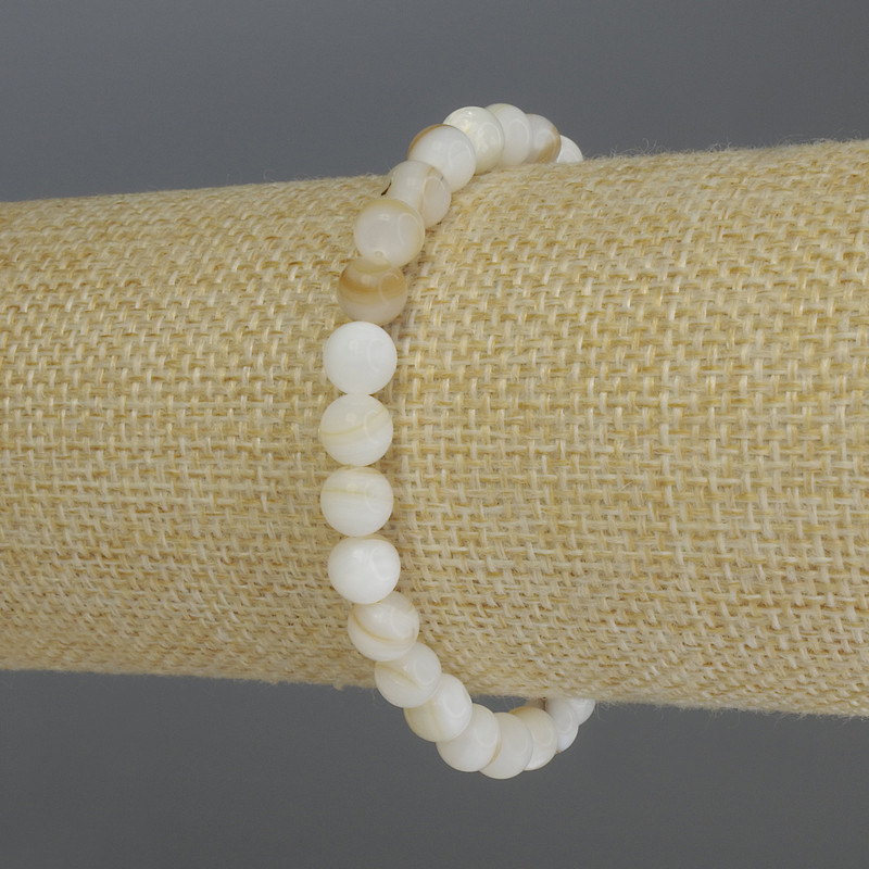 Náramek z perleti, hladké kuličky, průměr 6 mm, délka 18 cm, elastický