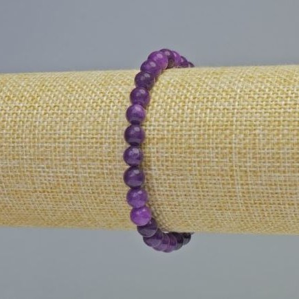 Náramek ze sugilitu – hladké kuličky, průměr 6 mm ± (elastická šňůrka), délka 18 cm+