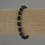 Náramek z dymového topazu, brusované zrno, průměr 8×6 mm ±, s rokajlem 3 mm ±, délka 18 cm, elastická guma