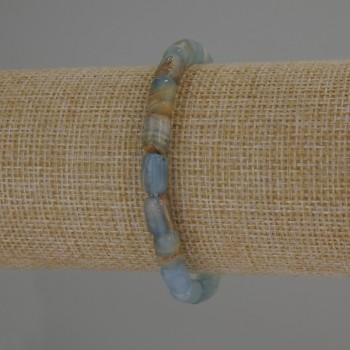 Náramek z modrého kalcitu, cylindrické korálky o průměru 9×6 mm, délka cca 18 cm, pružný