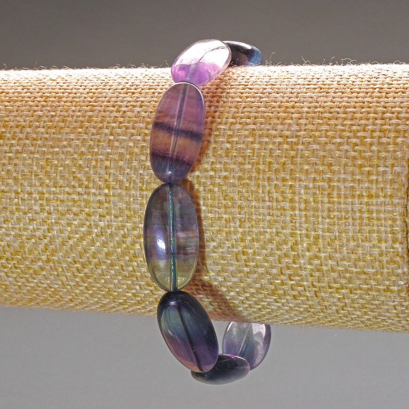Náramek z přírodního fluoritového kamene, oválné korálky o rozměru 10×20 mm, délka 18 cm (na gumičce)
