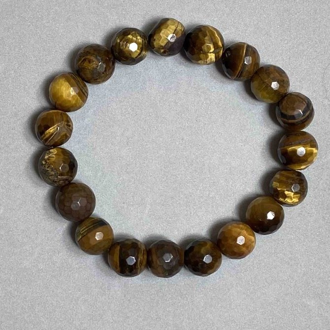 Náramek z tygřího oka s facettovanou kuličkou, průměr 10 mm, délka 18 mm, elastický