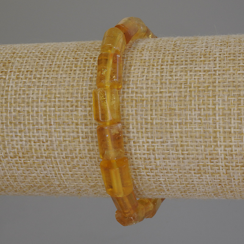 Náramek z citrínu, broušený, průměr 9–11×7 mm, délka 18 cm, na pružné šňůrce
