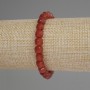 Náramek z karneolu, broušené kubické korálky, průměr 7 mm, délka cca 18 cm, elastická šňůra