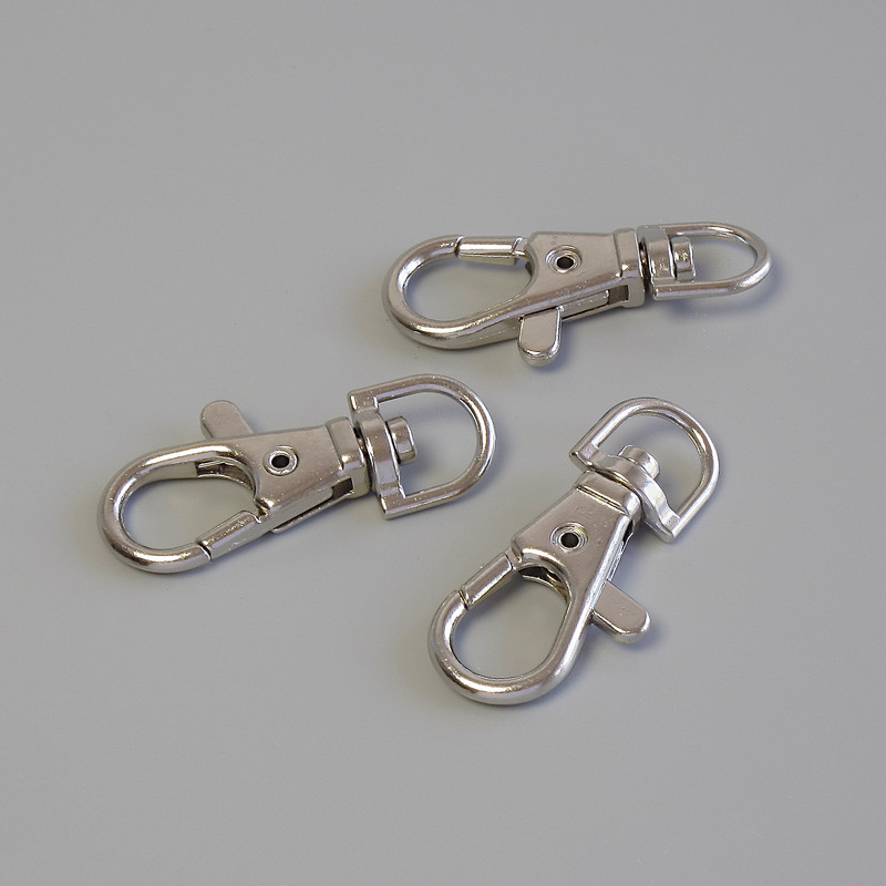 Cena za balení /10 ks. karabinkový zámek, průměr 37×16 mm, barva kovu stříbrná
