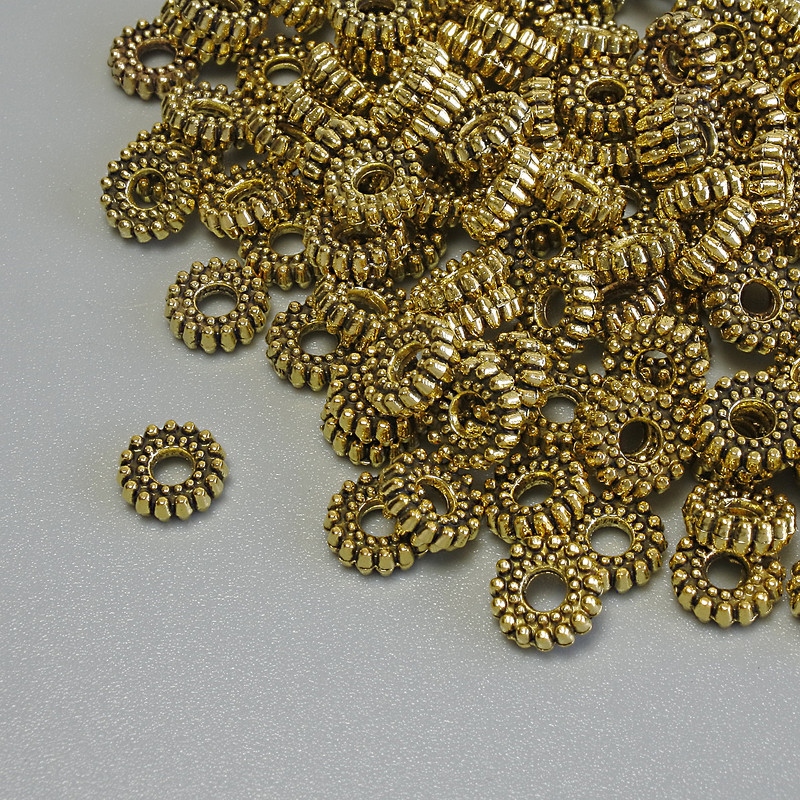 Zlaté korálkové vložky 6×2 mm, otvor 2 mm, balení 20 g (~109 ks)