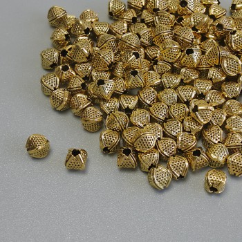 Korálka-vložka zlaté barvy, průměr 4×3,5 mm, díra cca 1,5 mm, balení 20 g (~130 ks)