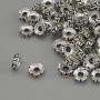 Stříbrná korálková vložka – barva kovu stříbrná, průměr 6×2 mm, otvor cca 2,3 mm, balení 20 g (~77 ks)