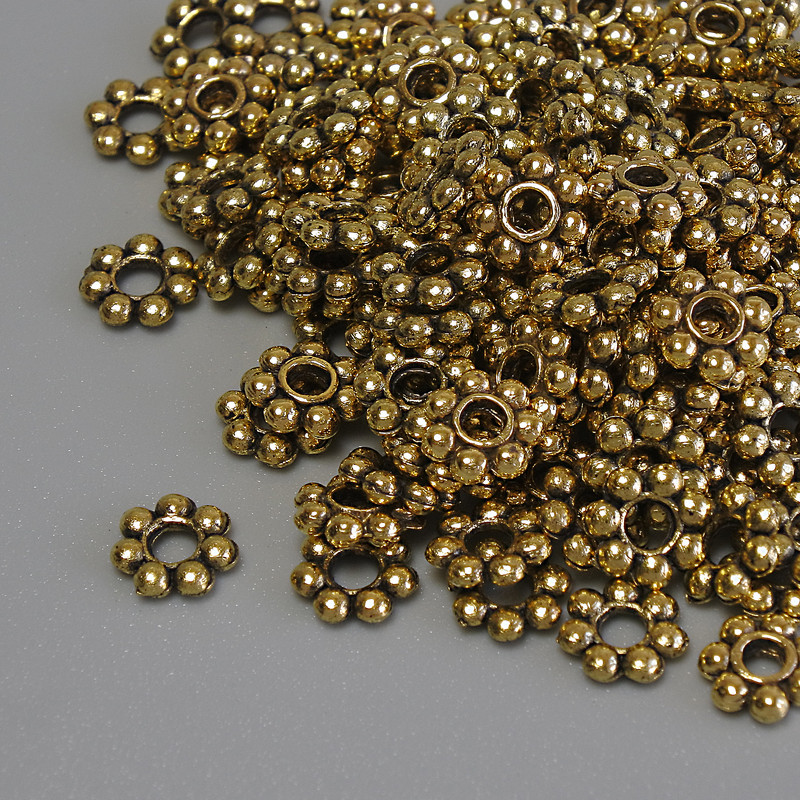Kovové komponenty – korálka-vložka, barva zlata, průměr 6×1,5 mm, otvor 2 mm, balení 20 g (~132 ks)