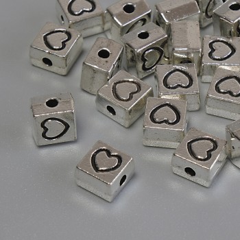 Stříbrná korálková vložka – barva kovu stříbrná, průměr 7 mm, díra cca 1,8 mm, balení 20 g (~19 ks)