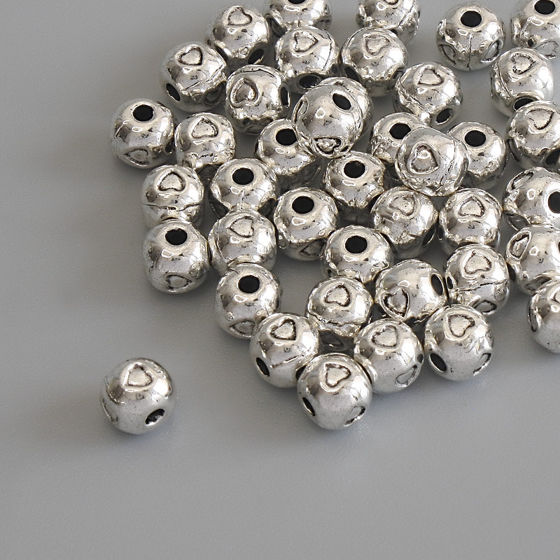 Korálka-vložka barva kovu stříbrná, průměr 5×4,5 mm, otvor 1,5 mm, balení 44 ks