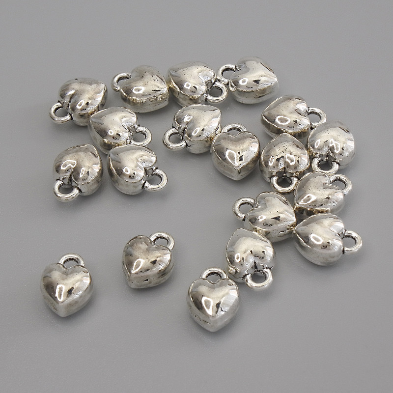 Přívěšek srdce, barva kovu stříbrná, průměr 9×7 mm, balení 18 ks